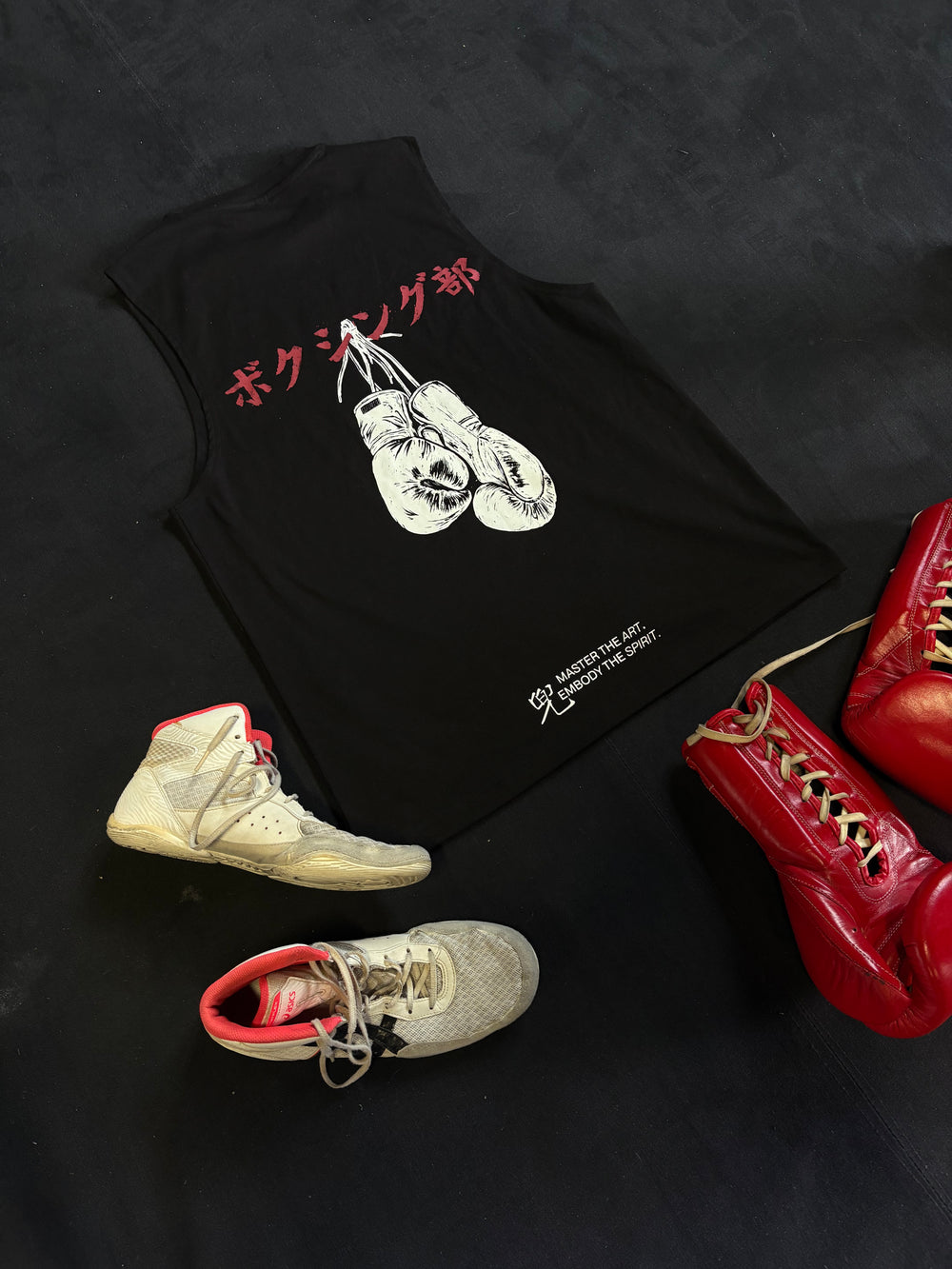 Kabuto Boxing Department tank laid beside boxing equipment