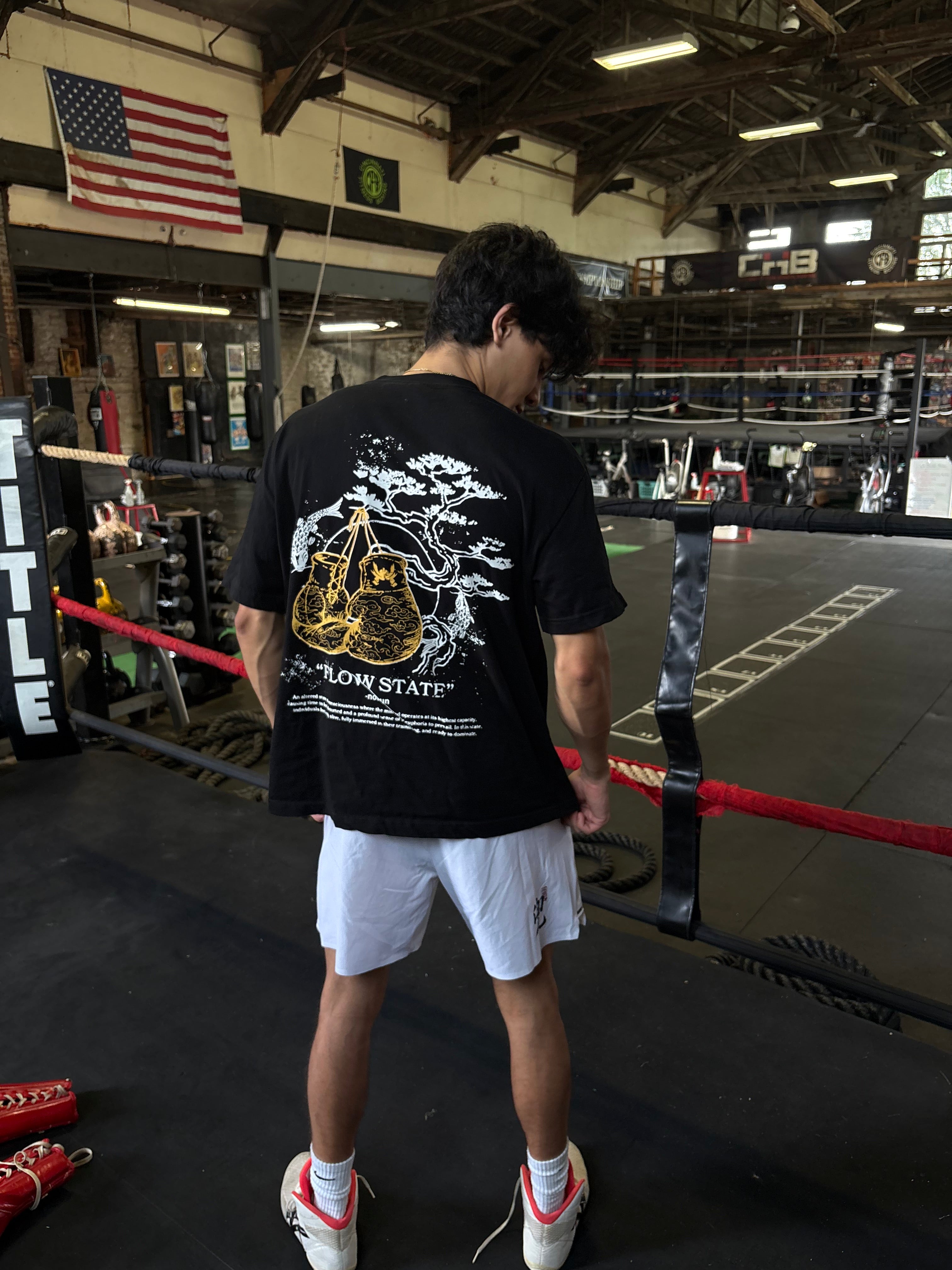 Kabuto Flow State T-shirt beside a boxing ring